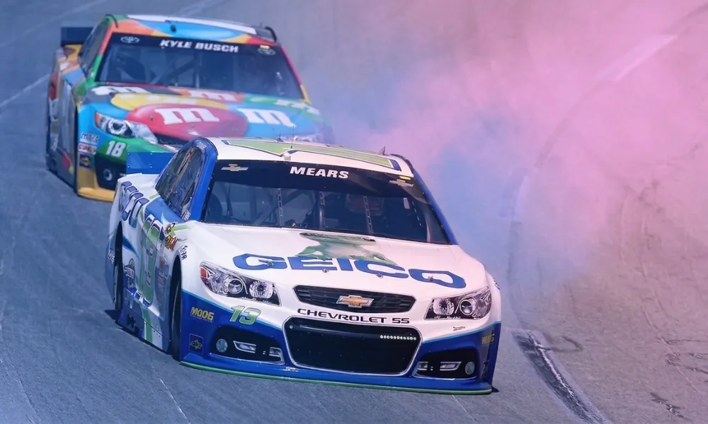 Kyle Busch driving the No. 18 M&Ms car on track